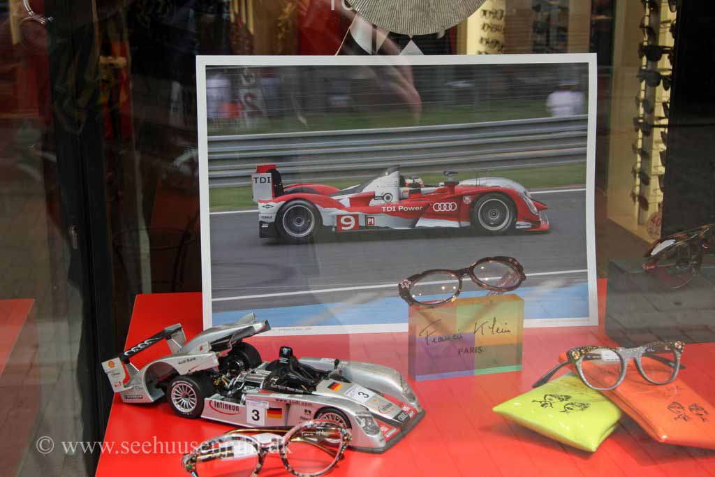 My photo from 2009 as a poster in a shop window